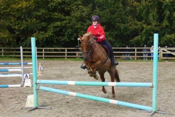 personne faisant de l'équitation